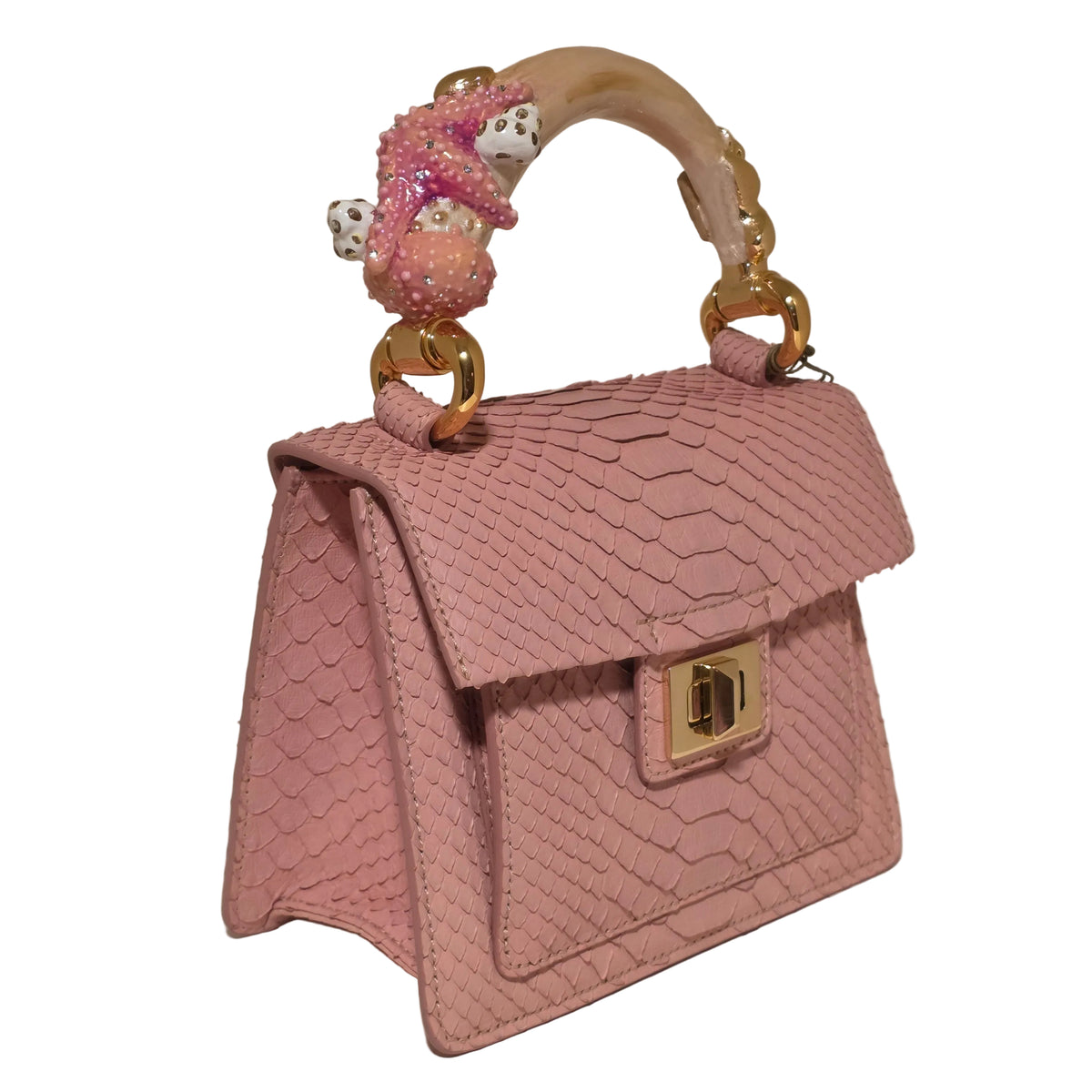 Biagini Art Bag –

Handcrafted in Bologna, Italy since 1968, the Biagini Art Bag is a masterclass in exquisite Italian artistry and uncompromising luxury. Designed to make a statement, this piece showcases genuine python finishes paired with rich, sumptuous suede interior lining. Every detail is meticulously finished, featuring a distinctive hand-painted enameled brass handle and gleaming gold-tone hardware.

Craftsmanship: Made in Italy
Brought to you by Rise And Shine Haven - BellaBarra.store