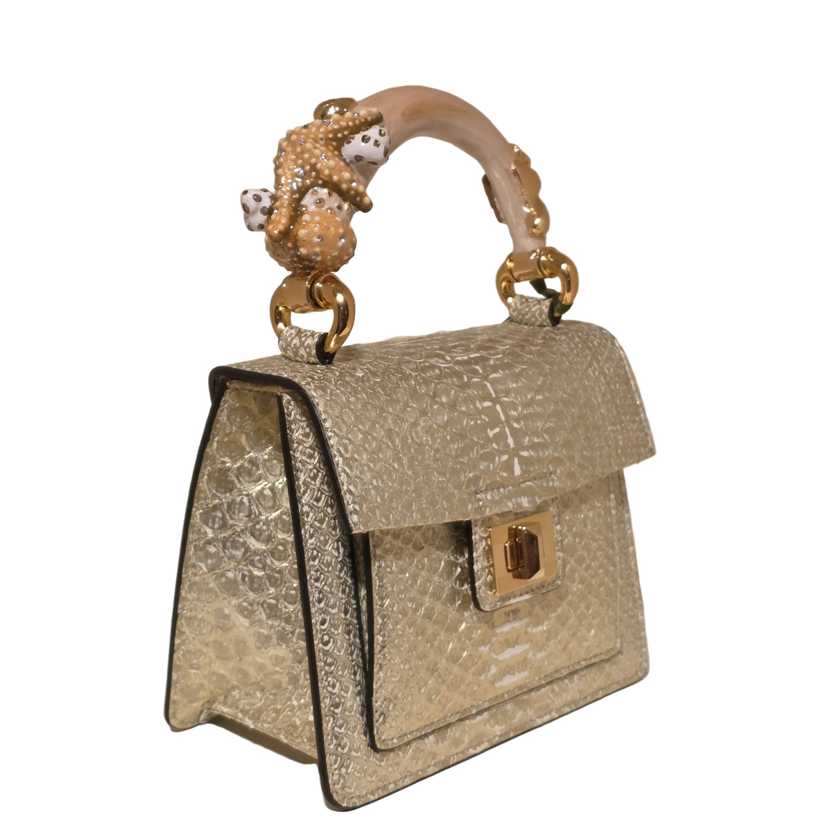 Biagini Art Bag –

Handcrafted in Bologna, Italy since 1968, the Biagini Art Bag is a masterclass in exquisite Italian artistry and uncompromising luxury. Designed to make a statement, this piece showcases genuine python finishes paired with rich, sumptuous suede interior lining. Every detail is meticulously finished, featuring a distinctive hand-painted enameled brass handle and gleaming gold-tone hardware.

Craftsmanship: Made in Italy
Brought to you by Rise And Shine Haven - BellaBarra.store