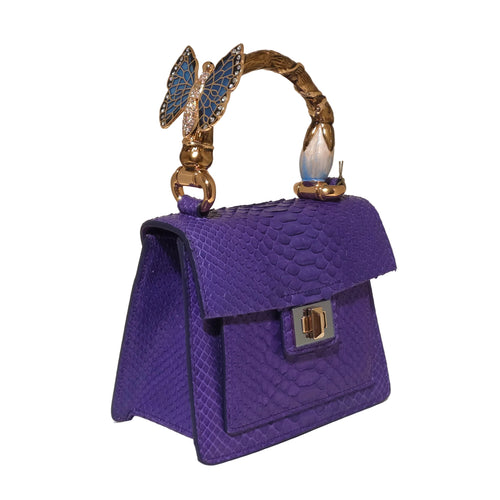 Biagini Art Bag –

Handcrafted in Bologna, Italy since 1968, the Biagini Art Bag is a masterclass in exquisite Italian artistry and uncompromising luxury. Designed to make a statement, this piece showcases genuine python finishes paired with rich, sumptuous suede interior lining. Every detail is meticulously finished, featuring a distinctive hand-painted enameled brass handle and gleaming gold-tone hardware.

Craftsmanship: Made in Italy
Brought to you by Rise And Shine Haven - BellaBarra.store
