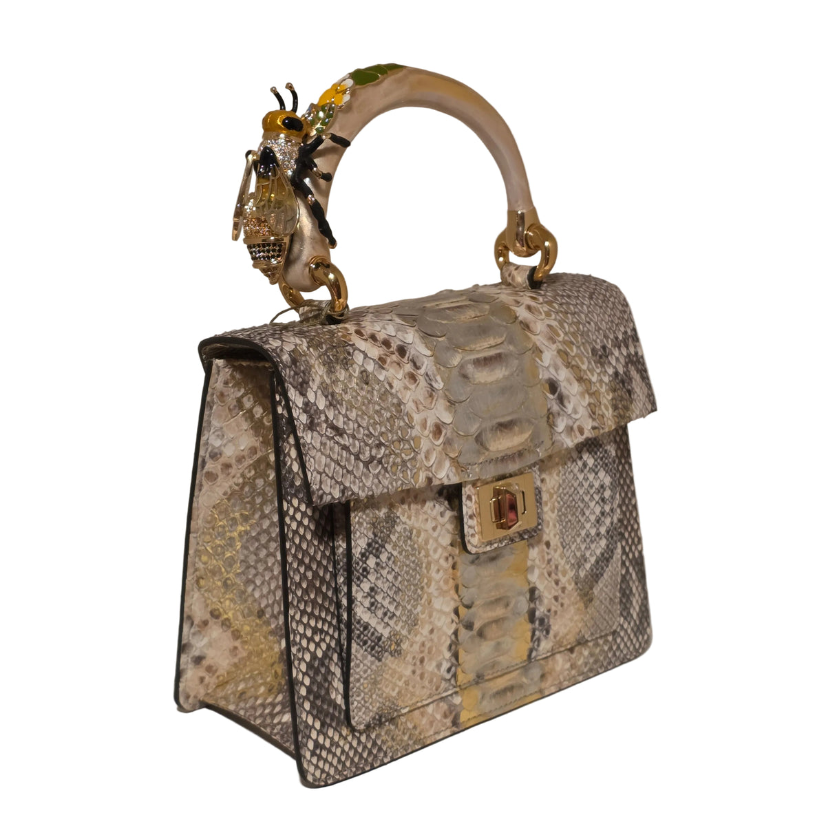 Biagini Art Bag –

Handcrafted in Bologna, Italy since 1968, the Biagini Art Bag is a masterclass in exquisite Italian artistry and uncompromising luxury. Designed to make a statement, this piece showcases genuine python finishes paired with rich, sumptuous suede interior lining. Every detail is meticulously finished, featuring a distinctive hand-painted enameled brass handle and gleaming gold-tone hardware.

Craftsmanship: Made in Italy
Brought to you by Rise And Shine Haven - BellaBarra.store
