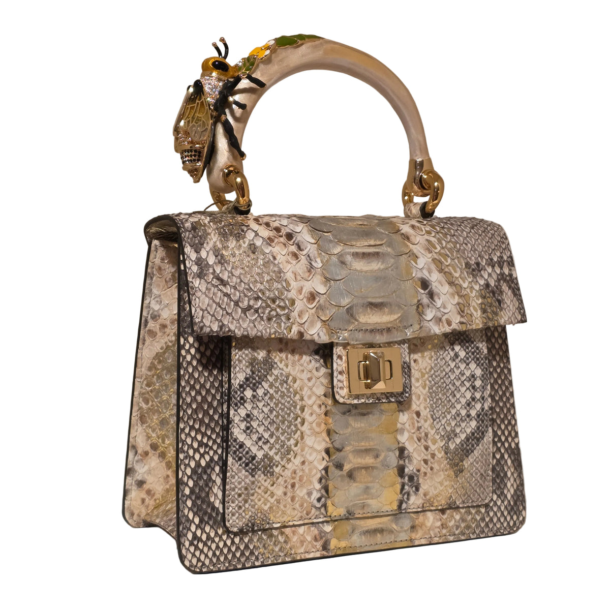 Biagini Art Bag –

Handcrafted in Bologna, Italy since 1968, the Biagini Art Bag is a masterclass in exquisite Italian artistry and uncompromising luxury. Designed to make a statement, this piece showcases genuine python finishes paired with rich, sumptuous suede interior lining. Every detail is meticulously finished, featuring a distinctive hand-painted enameled brass handle and gleaming gold-tone hardware.

Craftsmanship: Made in Italy
Brought to you by Rise And Shine Haven - BellaBarra.store