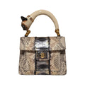 Biagini Art Bag –

Handcrafted in Bologna, Italy since 1968, the Biagini Art Bag is a masterclass in exquisite Italian artistry and uncompromising luxury. Designed to make a statement, this piece showcases genuine python finishes paired with rich, sumptuous suede interior lining. Every detail is meticulously finished, featuring a distinctive hand-painted enameled brass handle and gleaming gold-tone hardware.

Craftsmanship: Made in Italy
Brought to you by Rise And Shine Haven - BellaBarra.store