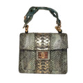 Biagini Art Bag –

Handcrafted in Bologna, Italy since 1968, the Biagini Art Bag is a masterclass in exquisite Italian artistry and uncompromising luxury. Designed to make a statement, this piece showcases genuine python finishes paired with rich, sumptuous suede interior lining. Every detail is meticulously finished, featuring a distinctive hand-painted enameled brass handle and gleaming gold-tone hardware.

Craftsmanship: Made in Italy
Brought to you by Rise And Shine Haven - BellaBarra.store