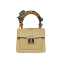 Biagini Art Bag –

Handcrafted in Bologna, Italy since 1968, the Biagini Art Bag is a masterclass in exquisite Italian artistry and uncompromising luxury. Designed to make a statement, this piece showcases genuine python finishes paired with rich, sumptuous suede interior lining. Every detail is meticulously finished, featuring a distinctive hand-painted enameled brass handle and gleaming gold-tone hardware.

Craftsmanship: Made in Italy
Brought to you by Rise And Shine Haven - BellaBarra.store