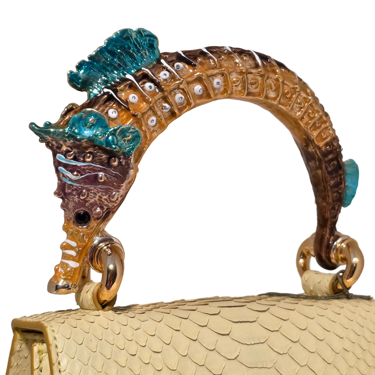 Biagini Art Bag –

Handcrafted in Bologna, Italy since 1968, the Biagini Art Bag is a masterclass in exquisite Italian artistry and uncompromising luxury. Designed to make a statement, this piece showcases genuine python finishes paired with rich, sumptuous suede interior lining. Every detail is meticulously finished, featuring a distinctive hand-painted enameled brass handle and gleaming gold-tone hardware.

Craftsmanship: Made in Italy
Brought to you by Rise And Shine Haven - BellaBarra.store
