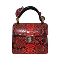 Biagini Art Bag –

Handcrafted in Bologna, Italy since 1968, the Biagini Art Bag is a masterclass in exquisite Italian artistry and uncompromising luxury. Designed to make a statement, this piece showcases genuine python finishes paired with rich, sumptuous suede interior lining. Every detail is meticulously finished, featuring a distinctive hand-painted enameled brass handle and gleaming gold-tone hardware.

Craftsmanship: Made in Italy
Brought to you by Rise And Shine Haven - BellaBarra.store