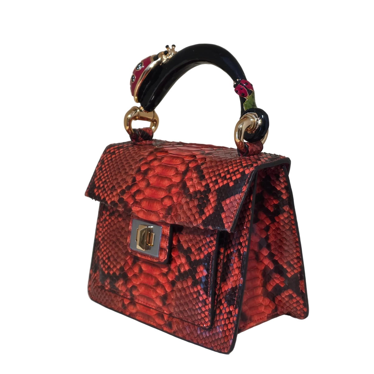 Biagini Art Bag –

Handcrafted in Bologna, Italy since 1968, the Biagini Art Bag is a masterclass in exquisite Italian artistry and uncompromising luxury. Designed to make a statement, this piece showcases genuine python finishes paired with rich, sumptuous suede interior lining. Every detail is meticulously finished, featuring a distinctive hand-painted enameled brass handle and gleaming gold-tone hardware.

Craftsmanship: Made in Italy
Brought to you by Rise And Shine Haven - BellaBarra.store