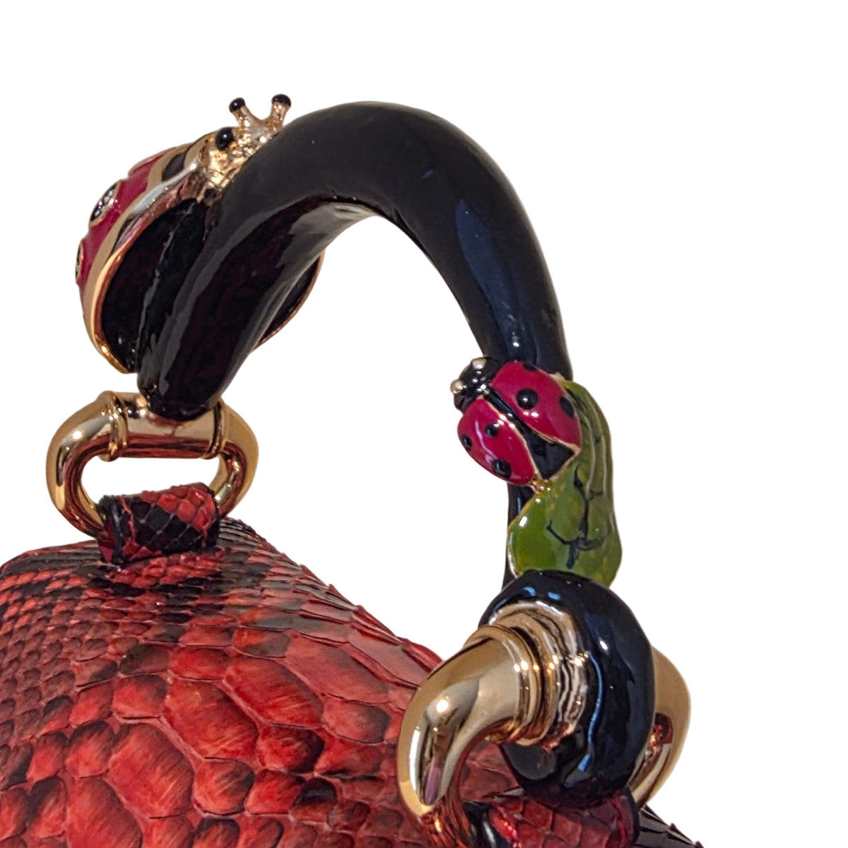 Biagini Art Bag –

Handcrafted in Bologna, Italy since 1968, the Biagini Art Bag is a masterclass in exquisite Italian artistry and uncompromising luxury. Designed to make a statement, this piece showcases genuine python finishes paired with rich, sumptuous suede interior lining. Every detail is meticulously finished, featuring a distinctive hand-painted enameled brass handle and gleaming gold-tone hardware.

Craftsmanship: Made in Italy
Brought to you by Rise And Shine Haven - BellaBarra.store