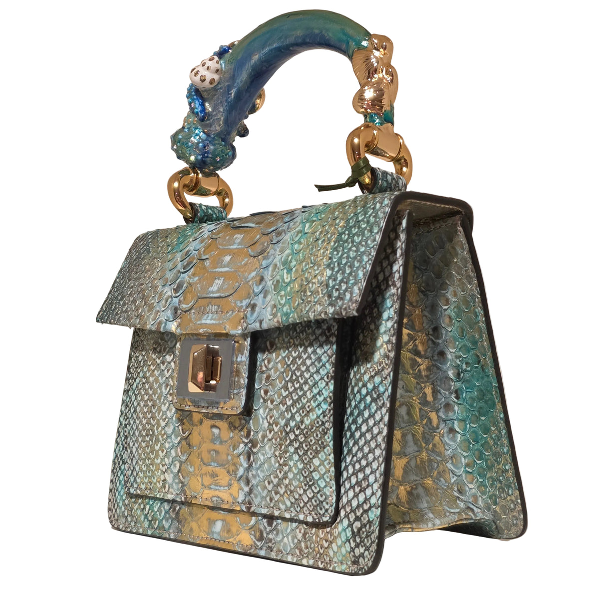 Biagini Art Bag –

Handcrafted in Bologna, Italy since 1968, the Biagini Art Bag is a masterclass in exquisite Italian artistry and uncompromising luxury. Designed to make a statement, this piece showcases genuine python finishes paired with rich, sumptuous suede interior lining. Every detail is meticulously finished, featuring a distinctive hand-painted enameled brass handle and gleaming gold-tone hardware.

Craftsmanship: Made in Italy
Brought to you by Rise And Shine Haven - BellaBarra.store